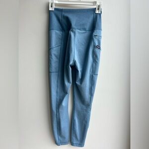 Patagonia Women’s Pack Out Tights in dusty blue.